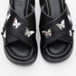 Force Black Butterfly‑Buckle Platform Slide (Women)