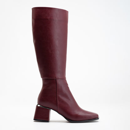 vegan knee high boots, burgundy knee high boots, cruelty-free footwear, eco-friendly fashion, sustainable boots, plant-based leather, burgundy vegan boots, non-leather boots, animal-free footwear, ethical fashion, vegan heeled boots, stylish knee high boots, elegant burgundy boots, high heel boots, vegan leather boots, luxurious vegan boots, women's vegan footwear