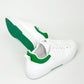 White and green sneakers, Green and white athletic shoes, Stylish white and green trainers, Chic green and white kicks, Trendy white and green footwear, Fashionable green and white sneakers, Elegant white and green sports shoes, Classic green and white running shoes, Comfortable white and green sneakers, White and green sneakers for casual wear.