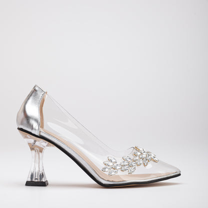Transparent silver heels, Cinderella-style silver heels, Glass slipper-inspired silver heels, Stylish transparent silver pumps, Chic clear silver high heels, Trendy see-through silver heels, Fashionable Cinderella heels, Elegant transparent silver stilettos, Classic glass slipper heels, Silver heels with a transparent finish.