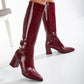 Vegan knee-high boots, black knee-high boots, burgundy knee-high boots, sustainable knee-high boots, cruelty-free knee-high boots, eco-friendly knee-high boots, vegan leather knee-high boots, women's knee-high boots, stylish knee-high boots, faux leather knee-high boots.