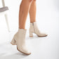 Vegan ankle-high boots, beige ankle-high boots, sustainable ankle-high boots, cruelty-free ankle-high boots, eco-friendly ankle-high boots, vegan leather beige boots, women's beige ankle boots, stylish beige ankle boots, faux leather ankle-high boots, beige vegan boots.