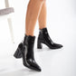 Vegan ankle-high boots, black ankle-high boots, sustainable ankle-high boots, cruelty-free ankle-high boots, eco-friendly ankle-high boots, vegan leather ankle-high boots, women's black ankle boots, stylish black ankle boots, faux leather ankle-high boots, black vegan boots.