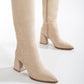 Vegan knee-high boots, beige knee-high boots, sustainable knee-high boots, women's vegan boots, cruelty-free knee-high boots, eco-friendly knee-high boots, vegan leather boots, stylish vegan boots, beige vegan boots, knee-high boots for women.