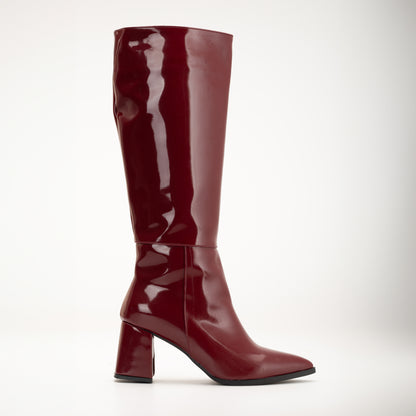 Vegan knee-high boots, black knee-high boots, burgundy knee-high boots, sustainable knee-high boots, cruelty-free knee-high boots, eco-friendly knee-high boots, vegan leather knee-high boots, women's knee-high boots, stylish knee-high boots, faux leather knee-high boots.