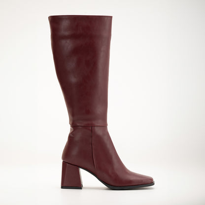 Vegan knee-high boots, black knee-high boots, burgundy knee-high boots, sustainable knee-high boots, cruelty-free knee-high boots, eco-friendly knee-high boots, vegan leather knee-high boots, women's knee-high boots, stylish knee-high boots, faux leather knee-high boots.