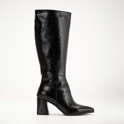 Vegan black knee-high boots, black vegan boots, cruelty-free knee-high boots, sustainable black boots, eco-friendly knee-high boots, vegan leather black boots, women's vegan black boots, stylish black vegan boots, faux leather knee-high boots, black boots for women.