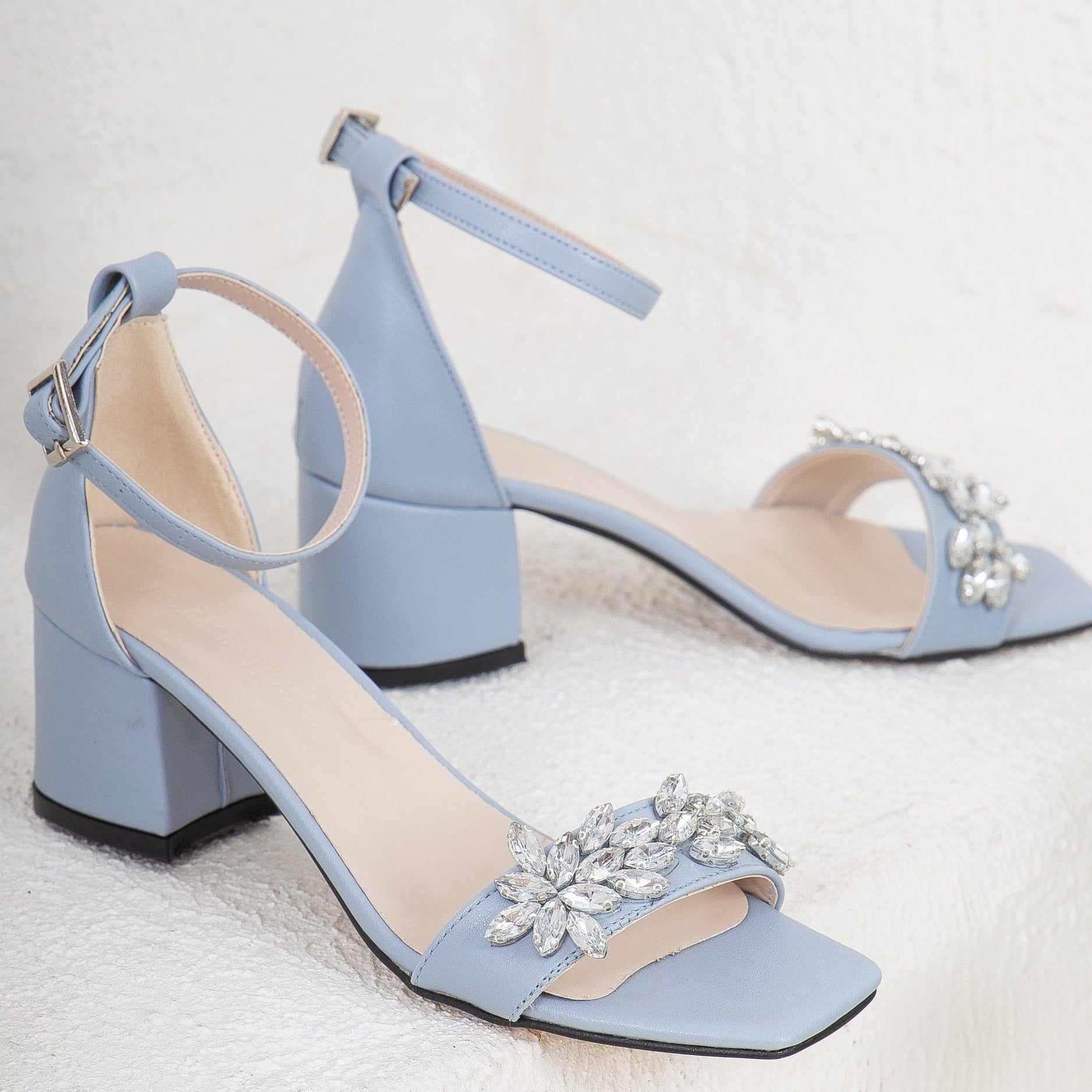 These 25 Festive Color Palettes Were Made for a Winter Wedding | Wedding  shoes heels, Bride shoes, Blue heels wedding